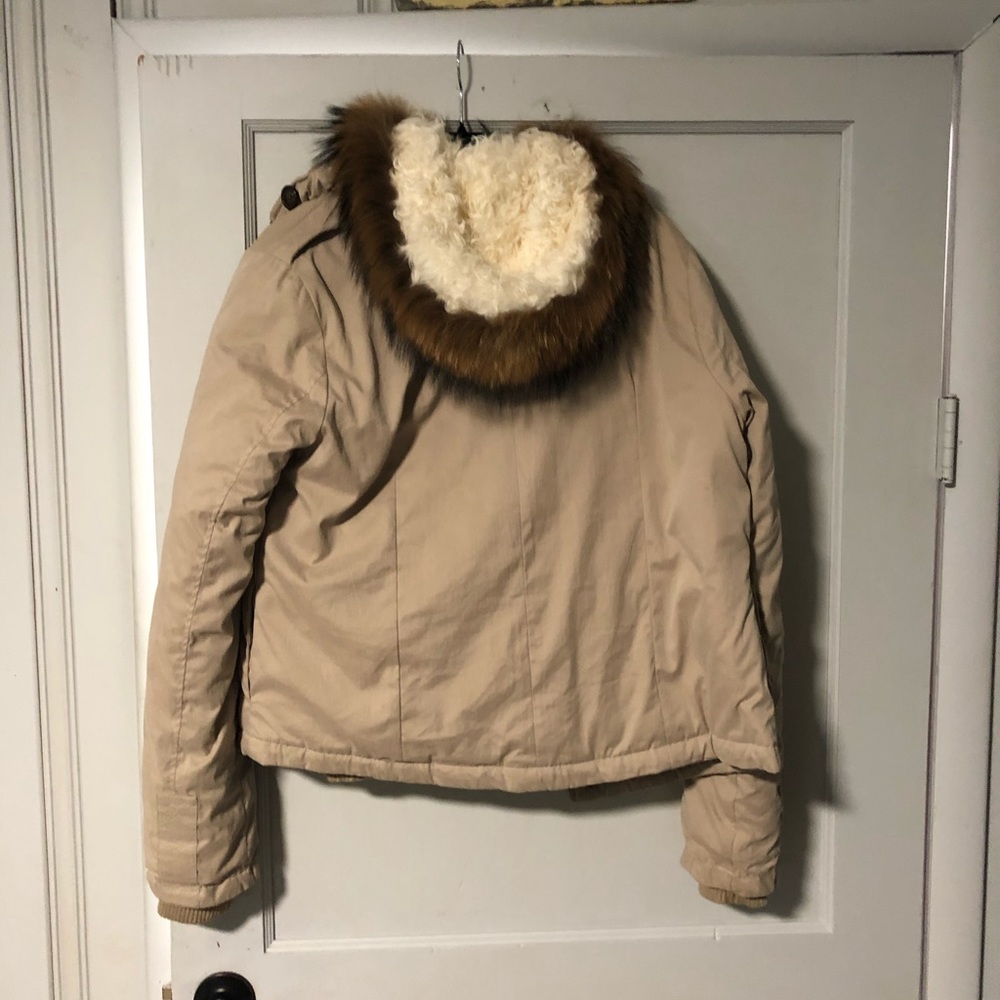 Woman’s jacket & fur collared vest